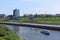 Cruise ship sails along the waterfront on the river in Tyumen