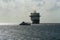 Cruise ship and tender in silhouette at Grand Cayman