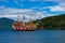 Cruise ship and Torii gate on Ashi lake