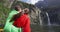 Cruise ship tourists on boat tour in Milford Sound, Fiordland, New Zealand