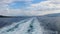 Cruise ship track with calm sea and cloudy sky in the morning at the Aegean Sea.