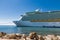 Cruise Ship Under Blue Beyond Rocks