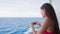 Cruise ship vacation woman taking photo with phone