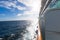 Cruise traverses sea in sun rays