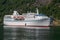 Cruise vessel Ocean Majesty ready to lower the anchor inside the Norwegian fjord