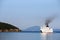 Cruiser sailing near Corfu island