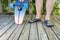 Cruising longboard on a wooden patio