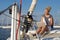 Cruising: Sailing woman working on a boat.