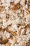 Crumbled leftover bread, food background texture, top down closeup view