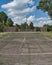 Crumbling Desolate Tennis Court in Paola Kansas