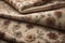 Crumpled beige fabric with floral pattern, closeup view. ai generative