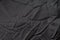 Crumpled black fabric texture