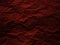 Crumpled dark red paper texture background