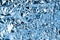 Crumpled light blue foil shining texture background, bright shiny cold icy design, metallic glitter surface