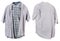 A crumpled old checkered and solid gray man`s shirts hangs on