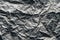 crumpled paper background. gray ashy matte color, shadows, planet surface, mountain view from space