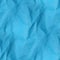 Crumpled paper texture - seamless blue background