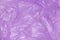 Crumpled purple plastic bag as background