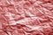 Crumpled sheet of paper with blur effect in red color