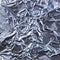 crumpled silver aluminum foil background texture