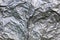 Crumpled thick aluminium foil wall insulation surface texture and background