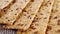 Crunchy crispbreads with falling sesame and flax seeds.