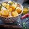 Crunchy croutons in bowl with rosemary