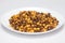 Crunchy Roasted Chana Masala in a white ceramic plate Top Lighting