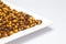 Crunchy Roasted Chana Masala in a white ceramic square plate Top Lighting