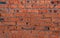 crush red brick wall texture grunge background, old interior design, panorama of masonry