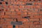 crush red brick wall texture grunge background, old interior design, panorama of masonry
