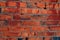Crush red brick wall texture  grunge background, old interior design, panorama of masonry pattern