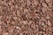 Crushed tree bark brown texture background. Shredded tree bark f