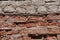 Crushed white and red brick wall