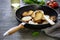 Crusty baguet pieces in cast iron pan