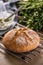 Crusty homemade yeast bread baked to perfection cooling down on metal griddle