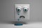 Crying character cube with sad face