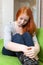 Crying red-headed lonely teenager girl