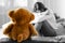 Crying woman and teddy bear. Lonely life concept