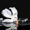 Cryogenic spa concept of delicate white hibiscus, zen stones wit