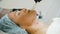 Cryotherapy facial beauty salon procedure, skin care woman face liquid nitrogen