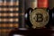 Crypto currency law, judge gavel, stacked legal book and bitcoin