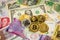 Cryptocurrency coins, electronic money on worldwide banknotes ca