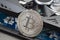 Cryptocurrency mining. Cryptocurrency mining. Bitcoin coin on a graphic card, video card for cryptocurrency mining.