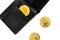 Cryptocurrency physical golden bitcoin coins for changing or selling white background top view