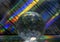 Crystal ball with colourful abstract spectrum on shiny surface