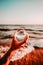 A crystal ball in your hand and the sea landscape in the background