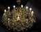 crystal chandelier with golden light, big retro rich chandelier, light in the castle