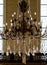 Crystal chandelier lighting in the big majestic hall