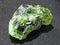 crystal of Chrome Diopside gemstone on dark